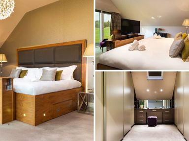 A bedroom with a large bed and pillows a television and a dressing area with drawers and a stool at Carus House at Carus Green Golf Club in Kendal