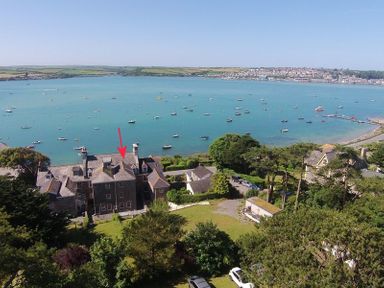 A coastal view with boats on the water and houses on the shore at 4 The Terrace in Rock