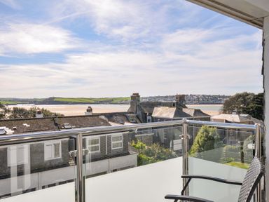 A balcony view overlooking the sea and houses at Slipway 15 in Rock
