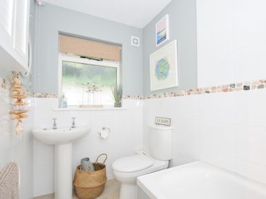 A bathroom with a sink and toilet at Rocklings in Rock