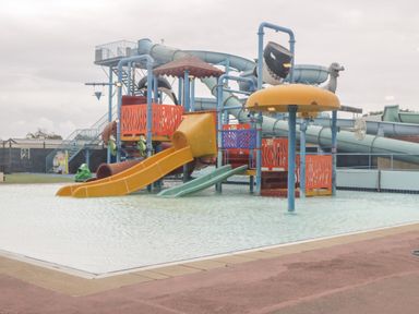 A children's water playground with slides and water features at Number 8 Lakes View in Brean