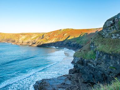 A coastal landscape with cliffs and waves at Chi Prenn Byhan in Tintagel