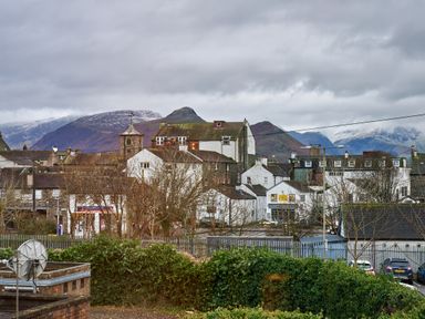A view of buildings and mountains at Riverside Park 5 in Keswick