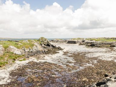 A coastal landscape with rocky shores and seaweed at Ti Tom Narta in Trabane near Lettermore County Galway