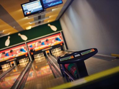 A bowling alley with lanes pins and bowling balls near the pins at Ridge's Retreat (No 7 Kigbeare Lodges) Ashbury Resort near Fowley Cross Sourton Down and Okehampton