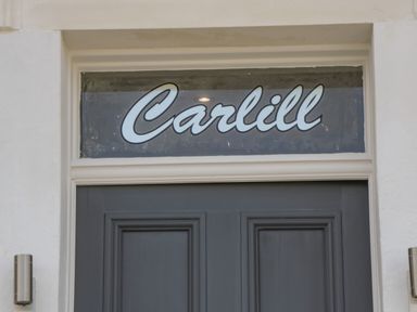 A door with a sign above it reading Carlill