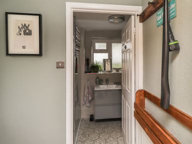 A bathroom with sink and mirror at Country Retreat in Ponteland