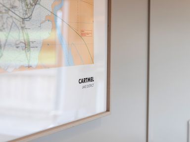 A framed map of Cartmel Lake District on a white wall at Middle Longlands Cartmel