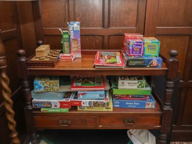 A table with various board games and puzzles at Henstead Hall in Henstead near Beccles