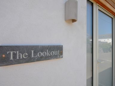 A sign indicating The Lookout at The Lookout in Polzeath