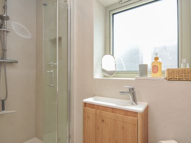 A bathroom featuring a shower and sink at The Lookout in Polzeath