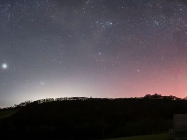 A night sky filled with stars and a silhouetted hill at Creuddyn, Llanfihangel-y-Creuddyn near Aberystwyth