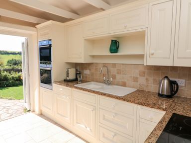 A kitchen with sink and appliances at Wayside near Kingsbridge
