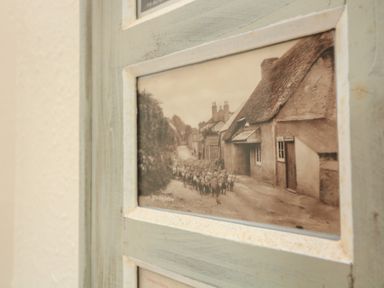 A vintage photograph of sheep on a street at Wayside near Kingsbridge