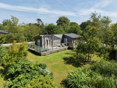 A house with a deck and garden at 6 Southern Place in Dobwalls