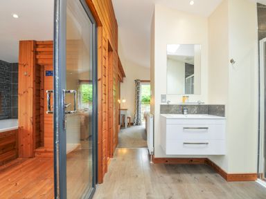 A bathroom with a shower and sink at 5 Faraway Fields in Dobwalls