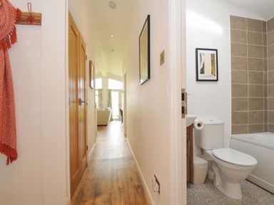 A bathroom with a toilet and sink at 8 Horizon View in Dobwalls