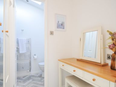 A bathroom with a console table and mirror at 9 Horizon View, Dobwalls