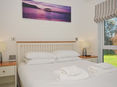 A bedroom with a double bed and nightstands at 10 Horizon View Dobwalls