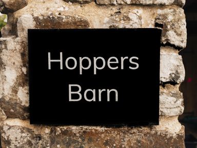 A sign displaying Hoppers Barn at Hoppers Barn near Pancrasweek near Holsworthy