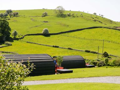A landscape with hills and buildings at Cherry in Ulverston