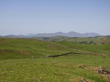 A landscape with grass and mountains at Cherry in Ulverston
