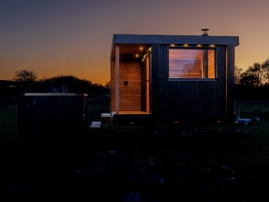 A trailer house with an outdoor bath at Lodge 15 Corfe Castle