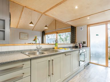 A kitchen with a sink and countertop at Lodge 17 in Corfe Castle