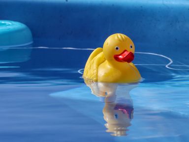 A yellow rubber duck floating in a blue pool of water at Parliament in Little Kelk near Bridlington
