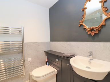 A bathroom with a sink and toilet at Well Cottage Nr Malmesbury
