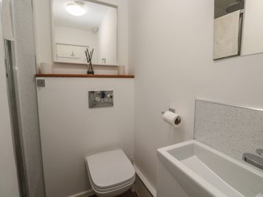 A bathroom with a sink and toilet at Bodillys Cottage Newlyn
