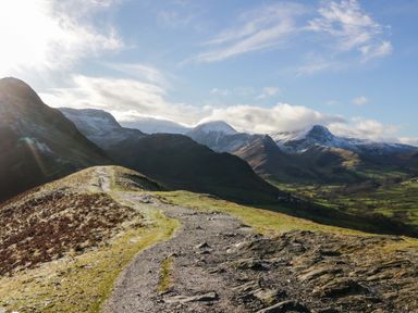 A mountain path leading through hills at Beech Timber Lodge in Keswick