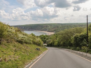 A view of a road leading down to the coast at Marigold Lodge in Runswick Bay near Staithes