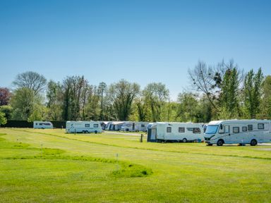 A row of caravans on a grassy area at Daisy in Eardisland
