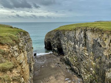A coastal view with cliffs and ocean at Tower Cottage Near Pembroke