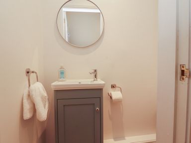 A bathroom with a sink and mirror at Silver How in Ambleside