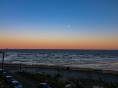 A view of the ocean and moon at Apt 6 @ Hunter's Quay in Bridlington