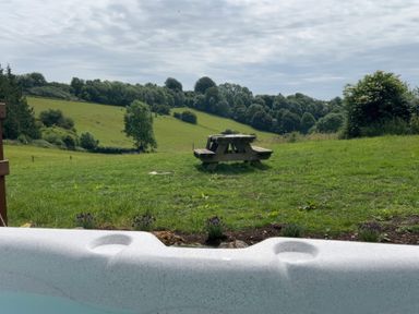 A picnic table in a grassy area at Primrose Higher Wambrook near Chard