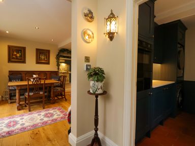 A dining room with a table and chairs at White House