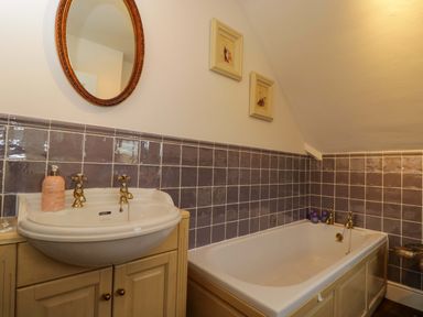 A bathroom with a sink and bathtub at White House