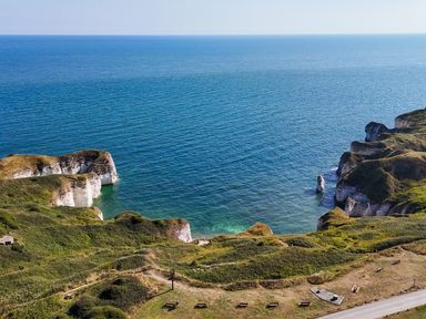 A coastal view of cliffs and sea at The Pheasantry in Flamborough