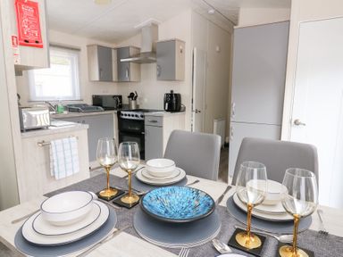 A dining room with table settings at The Haven