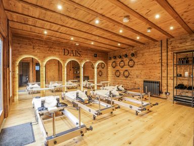 A fitness studio with reformers and mirrors at Squirrel's Nest in South Luffenham near Edith Weston