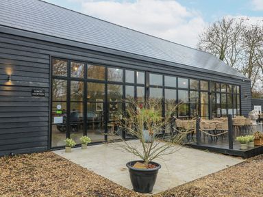 A reception area with outdoor seating at Otter's View South Luffenham near Edith Weston