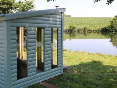 A cabin by a lake at Holmside Audley Brow near Market Drayton