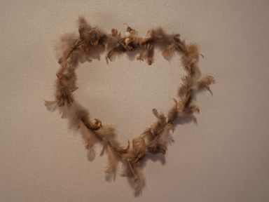 A heart-shaped decoration made of feathers and twine at The Hoot in Great Finborough near Stowmarket