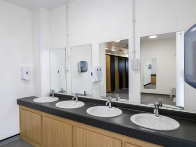 A public restroom with four sinks and mirrors above at Daisy Cow Shed 1 Easton near Campsea Ashe