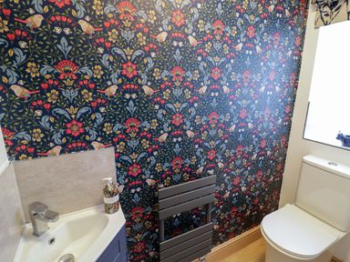A bathroom with a sink and toilet at The Barn in Astwood Bank