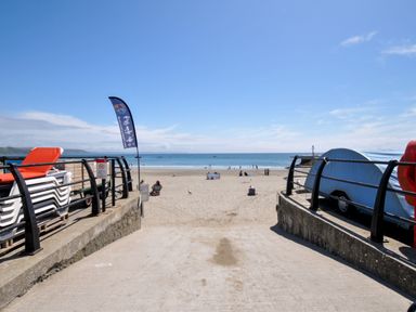 A beach view with sea and sand at Sea Pinks in Looe