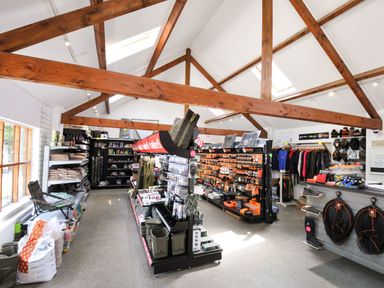 A retail space with shelves of tools and camping equipment at Silver Birch in Dolton
